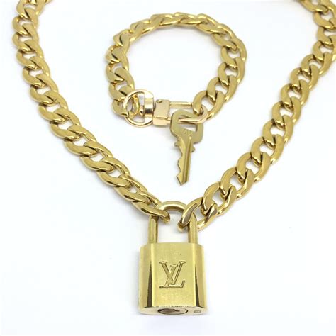 louis vuitton lock and key chain|real louis vuitton keychain.